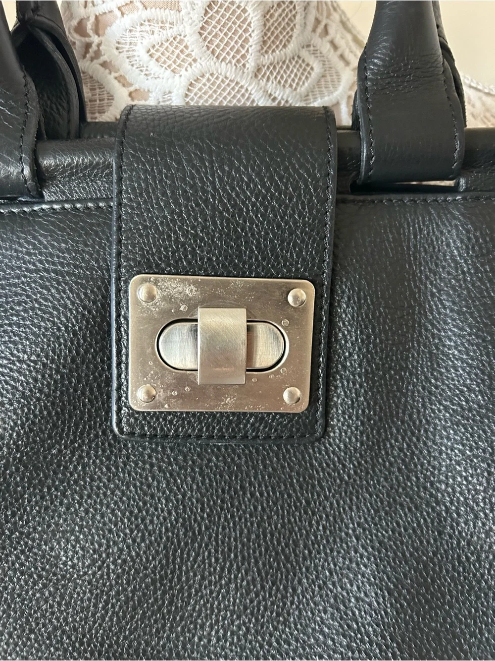 Structured Black Leather Satchel with Polished Hardware